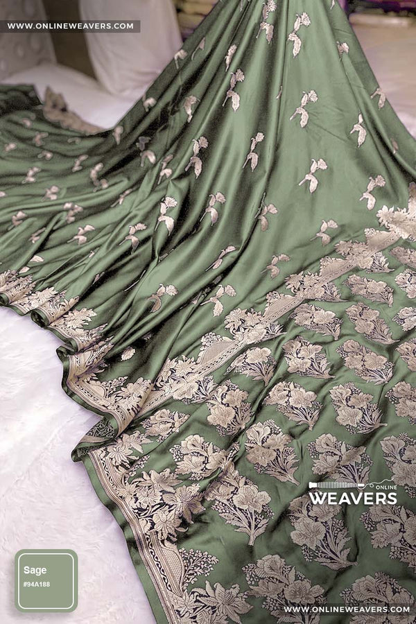 Sage green Banarasi silk saree with intricate gold zari rose floral woven work, draped elegantly to showcase its border and pattern. "OnlineWeavers' branding
