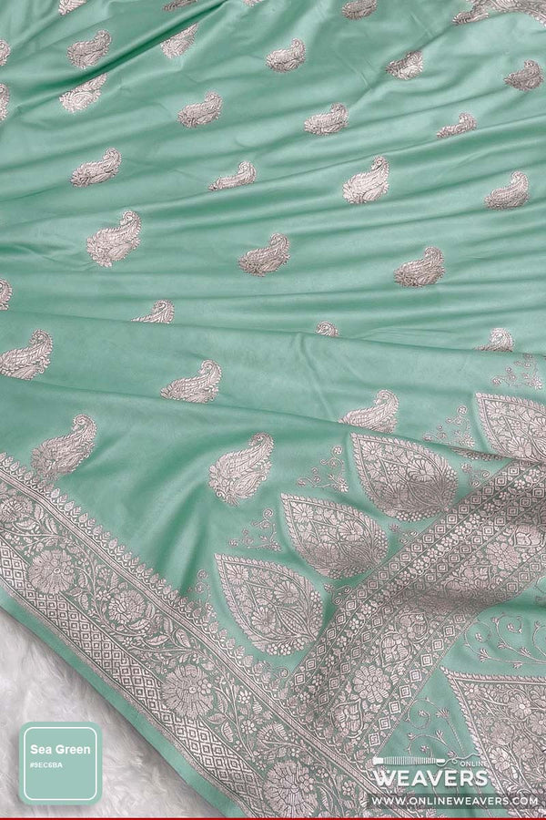 A mint green or sea green Banarsi silk saree with light gopl zari woven paisley motifs, 'OnlineWeavers' Branding.
