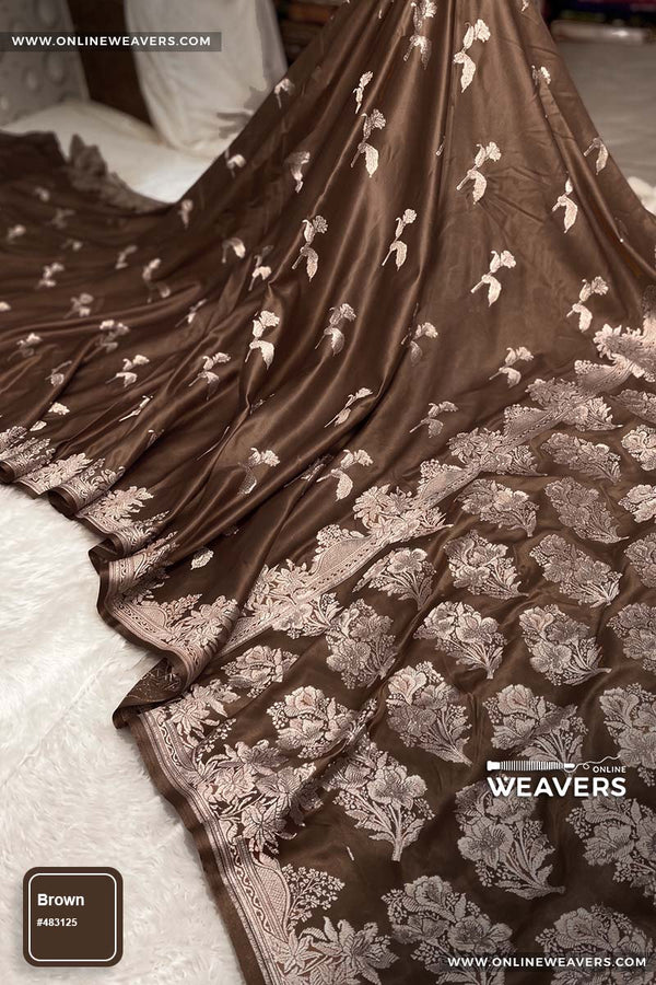 Coffee Brown Banarasi silk saree with intricate gold zari rose floral woven work, draped elegantly to showcase its border and pattern. "OnlineWeavers' branding