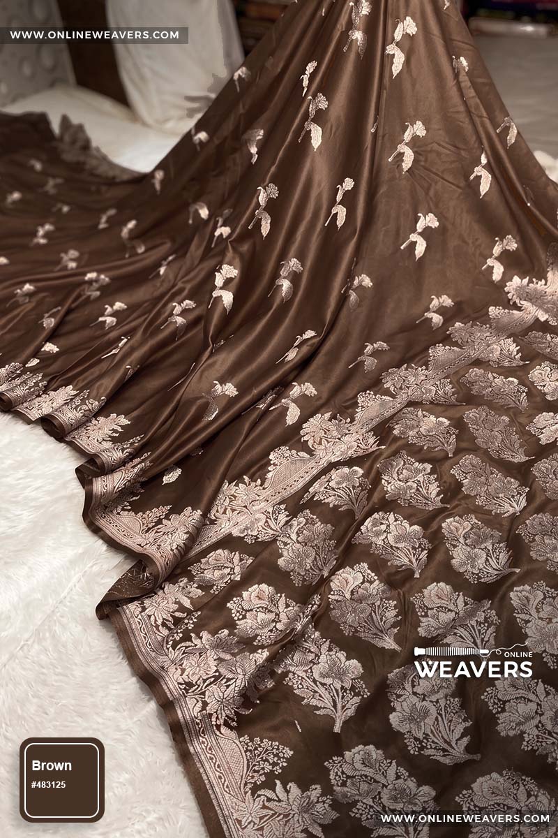 Coffee Brown Banarasi silk saree with intricate gold zari rose floral woven work, draped elegantly to showcase its border and pattern. "OnlineWeavers' branding
