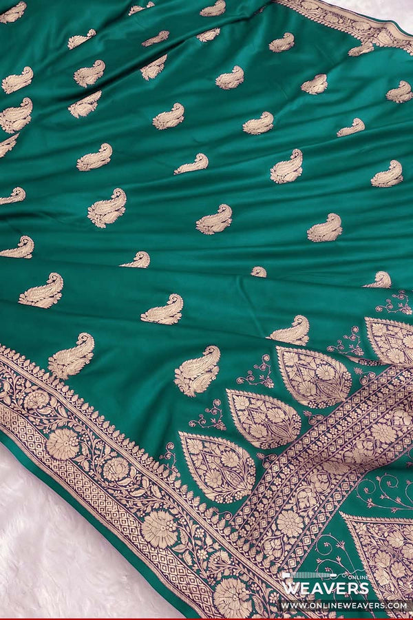 A Sapphire Green Banarasi Mashru Silk Saree with intricate paisley motifs and zari woven work | KL143 | Online Weavers