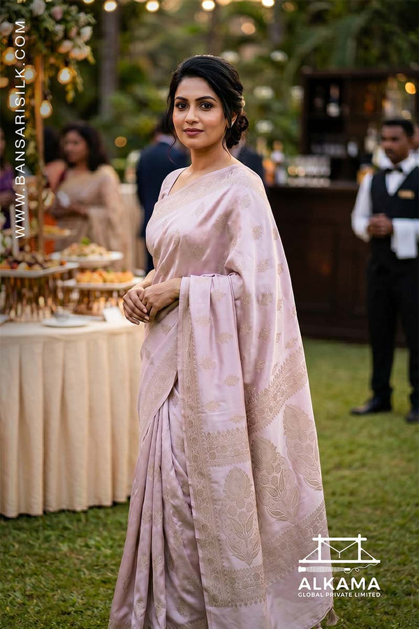 Lilac-white Banarasi Mashru silk saree with 'Varanasi saree Manufacturer weaver' branding