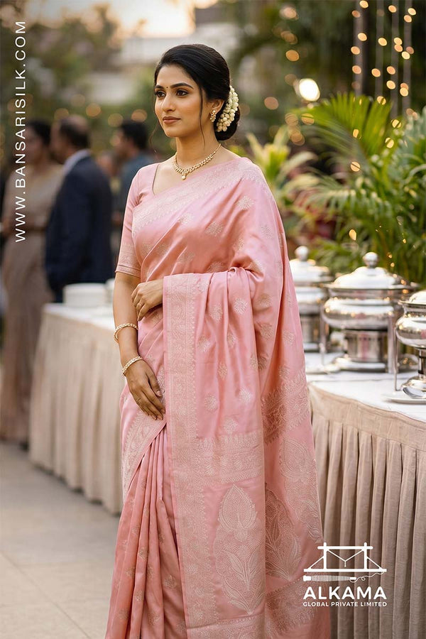 Baby pink Banarasi Mashru silk saree with 'Varanasi saree Manufacturer weaver' branding