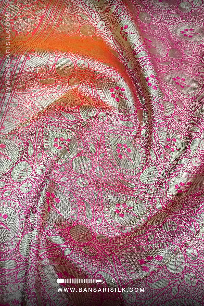 Orange And Pink Banarasi Silk Saree designed for wedding and bollywood gala events.