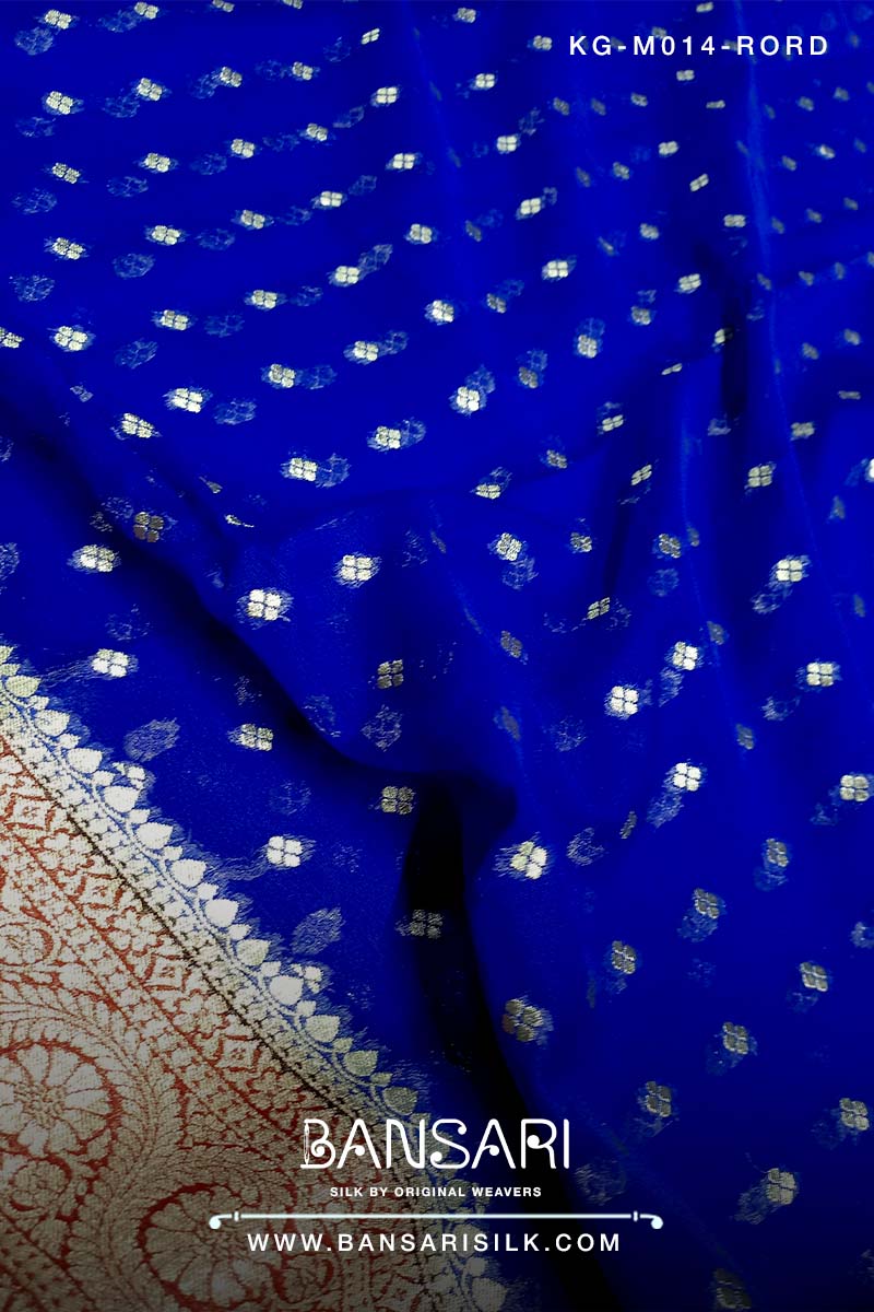 Blue georgette saree with white patterns and 'Bansari' branding